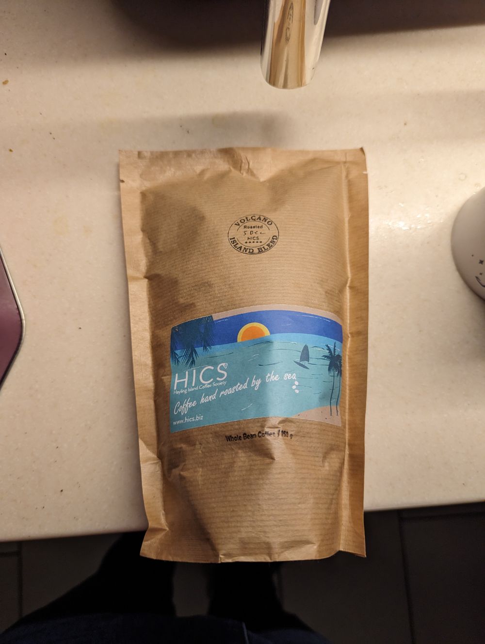 a bag of coffee on a white counter top