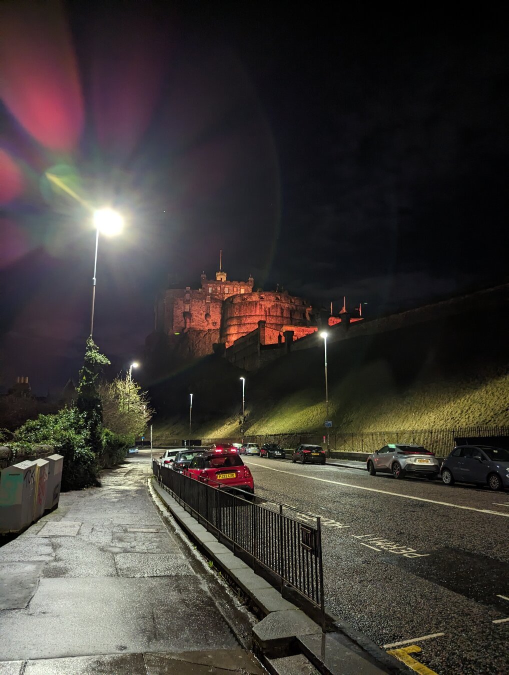 Edinburgh castle with a touch of lens flare from the street lighting